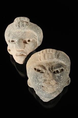 Dwie ceramiczne twarze